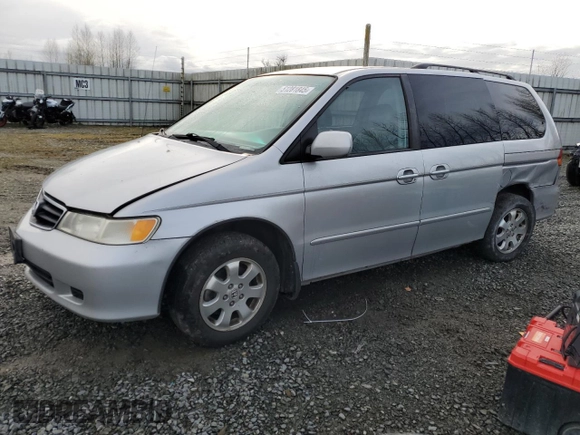 2002 Honda Odyssey EX z VIN 2HKRL18692H578746, wystawiony jako Copart lot #51281845 z przebiegiem 282 844 mil mil oraz Szkoda całkowita • Salvage title. Historia ofert i sprzedaży dostępna na DreamBid. Obrazek 1.