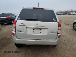 2012 Suzuki Grand Vitara Premium z VIN JS3TD0D66C4100621, wystawiony jako Copart lot #86968164 z przebiegiem Nie podano mil oraz Szkody całkowita. Historia ofert i sprzedaży dostępna na DreamBid. Obrazek 6.