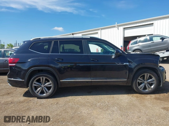 2019 Volkswagen Atlas SEL R-Line z VIN 1V2RR2CA0KC579035, wystawiony jako IAAI lot #42205407 z przebiegiem 66 188 mil mil oraz . Historia ofert i sprzedaży dostępna na DreamBid. Obrazek 13.