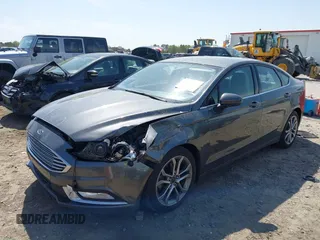 2017 Ford Fusion S with VIN 3FA6P0G73HR240251, listed as a IAAI auction lot 41940426 with 282,023 mi miles. Bid and sale history available at carsss.com. Image 2.