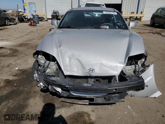 2006 Hyundai Tiburon GT z VIN KMHHN65F76U190851, wystawiony jako Copart lot #45935795 z przebiegiem 102 335 mil mil oraz Szkoda całkowita • Salvage title. Historia ofert i sprzedaży dostępna na DreamBid. Obrazek 5.