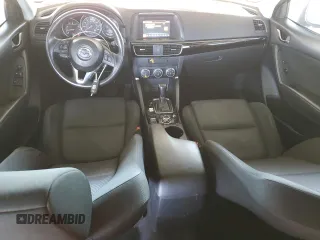 2016 Mazda CX-5 Sport with VIN JM3KE2BY8G0837203, listed as a Copart auction lot 54960845 with 116,656 mi miles and Salvage title. Bid and sale history available at DreamBid. Image 8.