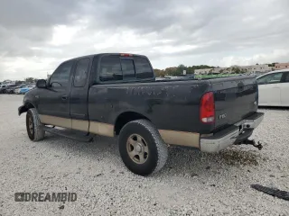 2000 Ford F-150 XL with VIN 1FTZX1721YNC09536, listed as a Copart auction lot 52645405 with 120,638 mi miles and Salvage Title. Bid and sale history available at carsss.com. Image 2.