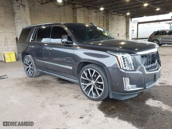2017 Cadillac Escalade Premium Luxury with VIN 1GYS3CKJ0HR263565, listed as a IAAI auction lot 41615401 with 105,773 mi miles. Bid and sale history available at carsss.com. Image 1.
