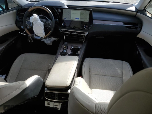 2024 Lexus RX 350 z VIN JTJCHMAA0R2015035, wystawiony jako Copart lot #51782225 z przebiegiem 9 880 mil mil oraz Szkoda całkowita • Salvage title. Historia ofert i sprzedaży dostępna na DreamBid. Obrazek 8.
