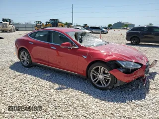 2013 Tesla Model S with VIN 5YJSA1CN1DFP26864, listed as a Copart auction lot 52029485 with 63,260 mi miles and Salvage Title. Bid and sale history available at DreamBid. Image 4.