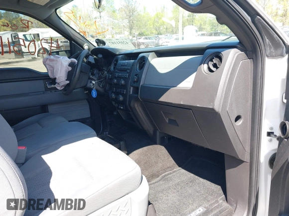 2014 Ford F-150 XL with VIN 1FTFX1EF3EKD09207, listed as a IAAI auction lot 42051107 with 106,664 mi miles. Bid and sale history available at carsss.com. Image 5.