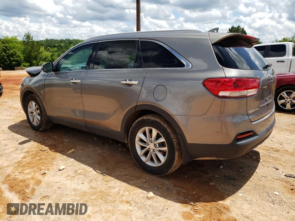 2017 Kia Sorento LX z VIN 5XYPG4A35HG297508, wystawiony jako Copart lot #56898275 z przebiegiem 137 498 mil mil oraz Szkoda całkowita • Salvage title. Historia ofert i sprzedaży dostępna na DreamBid. Obrazek 2.