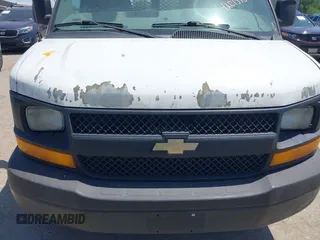 2011 Chevrolet Express Cargo Van with VIN 1GCZGUCGXB1114930, listed as a IAAI auction lot 42015104 with 364,789 mi miles. Bid and sale history available at carsss.com. Image 6.