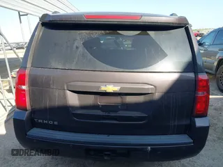 2015 Chevrolet Tahoe LS z VIN 1GNSCAKCXFR628303, wystawiony jako IAAI lot #42002698 z przebiegiem 152 141 mil mil oraz . Historia ofert i sprzedaży dostępna na DreamBid. Obrazek 16.