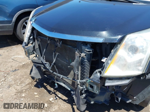 2012 Cadillac SRX Premium Collection with VIN 3GYFNFE30CS613728, listed as a IAAI auction lot 42288990 with 228,432 mi miles and . Bid and sale history available at DreamBid. Image 6.