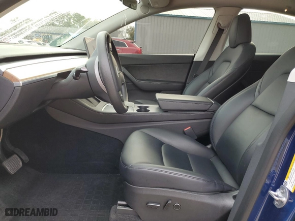 2022 Tesla Model Y Long Range with VIN 7SAYGDEE4NA002854, listed as a Copart auction lot 43521045 with 22,864 mi miles and Salvage Title. Bid and sale history available at carsss.com. Image 7.