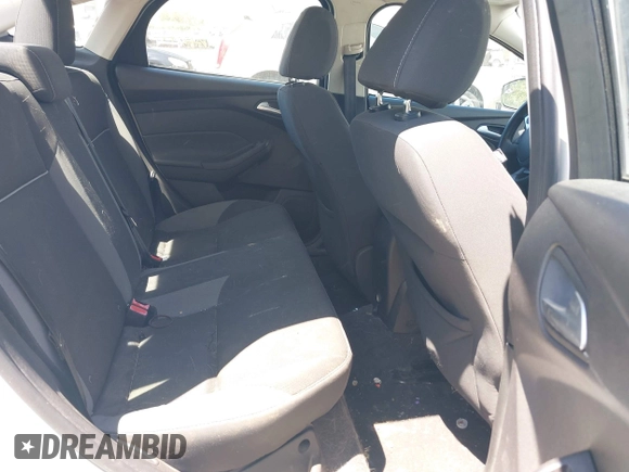 2013 Ford Focus SE z VIN 1FADP3F25DL290446, wystawiony jako IAAI lot #42520571 z przebiegiem 158 020 mil mil oraz . Historia ofert i sprzedaży dostępna na DreamBid. Obrazek 8.