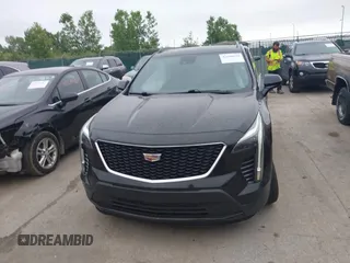 2019 Cadillac XT4 AWD Sport z VIN 1GYFZFR48KF197731, wystawiony jako IAAI lot #42668639 z przebiegiem 73 170 mil mil oraz . Historia ofert i sprzedaży dostępna na DreamBid. Obrazek 12.