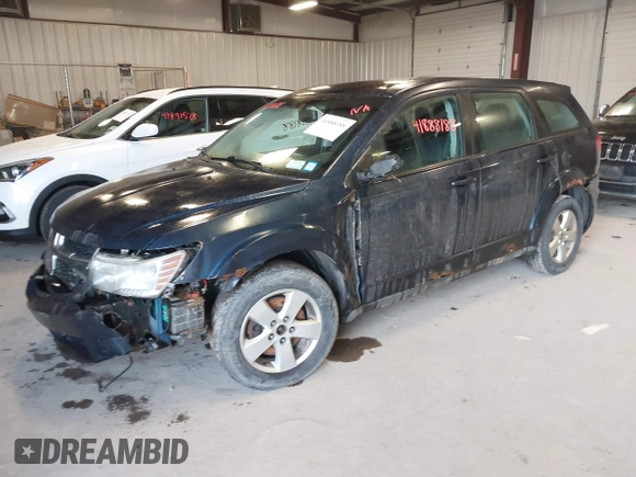 2013 Dodge Journey American Value with VIN 3C4PDCAB3DT594824, listed as a IAAI auction lot 41888188 with 189,053 mi miles and . Bid and sale history available at DreamBid. Image 2.