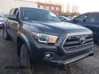 2017 Toyota Tacoma SR5 with VIN 3TMCZ5AN4HM104459, listed as a IAAI auction lot 41207997 with 80,103 mi miles. Bid and sale history available at carsss.com. Image 1.