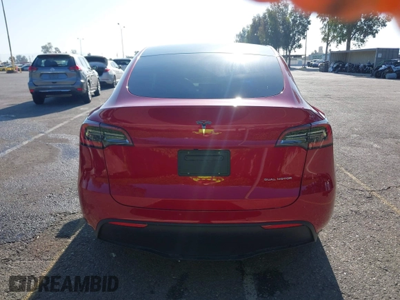 2020 Tesla Model Y Long Range with VIN 5YJYGDEE8LF057014, listed as a IAAI auction lot 41988113 with 18,246 mi miles and . Bid and sale history available at DreamBid. Image 17.