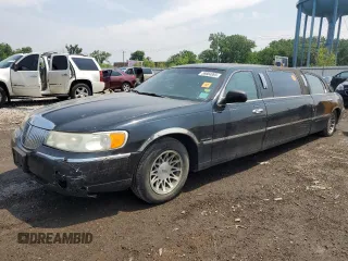 1999 Lincoln Town Car Executive with VIN 1L1FM81W8XY710157, listed as a Copart auction lot 59804965 with Not provided miles and Salvage title. Bid and sale history available at DreamBid. Image 1.