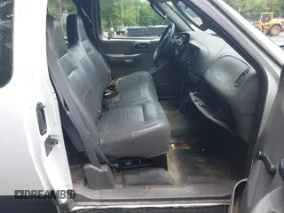 2004 Ford F-150 XL with VIN 2FTRX18W64CA04330, listed as a IAAI auction lot 42656922 with 165,327 mi miles and . Bid and sale history available at DreamBid. Image 5.
