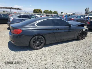 2014 BMW 4 Series 428i with VIN WBA3N3C57EF712370, listed as a Copart auction lot 63108215 with 151,779 mi miles and Salvage title. Bid and sale history available at DreamBid. Image 3.