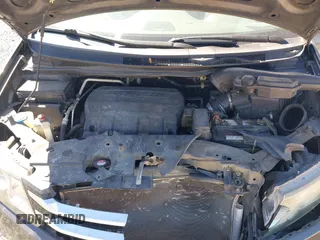2014 Honda Odyssey EX-L with VIN 5FNRL5H61EB014695, listed as a IAAI auction lot 41694860 with 261,265 mi miles and . Bid and sale history available at DreamBid. Image 10.