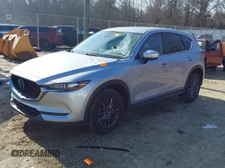 2020 Mazda CX-5 Touring with VIN JM3KFACM8L0727393, listed as a IAAI auction lot 41492627 with 91,521 mi miles. Bid and sale history available at carsss.com. Image 21.