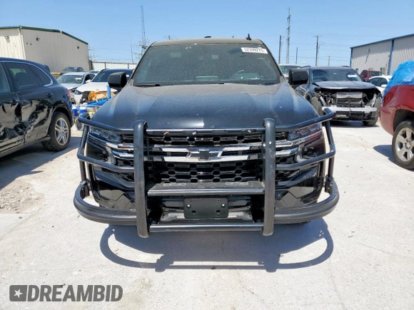 2023 Chevrolet Tahoe Commercial with VIN 1GNSCLEDXPR447042, listed as a Copart auction lot 52399275 with 22,205 mi miles and Salvage title. Bid and sale history available at DreamBid. Image 5.