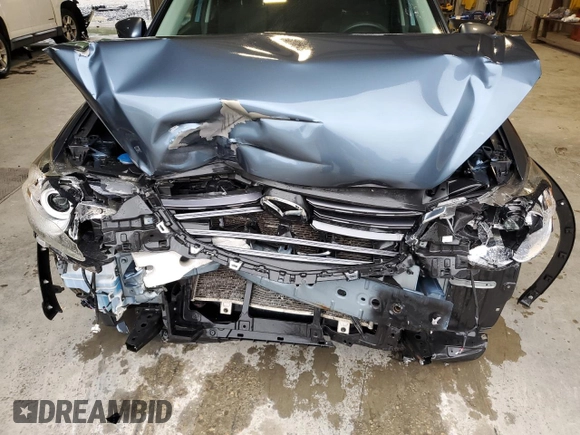 2016 Mazda CX-5 Sport z VIN JM3KE4BY0G0628372, wystawiony jako Copart lot #57534785 z przebiegiem 152 487 mil mil oraz Szkoda całkowita • Salvage title. Historia ofert i sprzedaży dostępna na DreamBid. Obrazek 12.