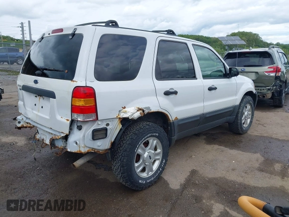 2003 Ford Escape XLT Popular 2 with VIN 1FMYU93193KC06499, listed as a IAAI auction lot 42192640 with 180,095 mi miles and . Bid and sale history available at DreamBid. Image 4.