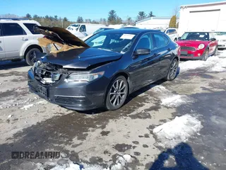 2015 Acura TLX V6 Tech with VIN 19UUB3F55FA000872, listed as a IAAI auction lot 41586406 with 142,067 mi miles. Bid and sale history available at carsss.com. Image 2.
