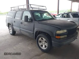 2002 Chevrolet Suburban LT z VIN 1GNFK16T92J132948, wystawiony jako IAAI lot #42439952 z przebiegiem 251 493 mil mil oraz . Historia ofert i sprzedaży dostępna na DreamBid. Obrazek 1.