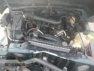 2001 Jeep Wrangler Sahara with VIN 1J4FA59S51P324010, listed as a Copart auction lot 43264515 with 163,056 mi miles and Salvage Title. Bid and sale history available at carsss.com. Image 12.