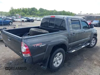 2013 Toyota Tacoma with VIN 3TMLU4EN0DM130912, listed as a IAAI auction lot 42682150 with 166,503 mi miles and . Bid and sale history available at DreamBid. Image 4.