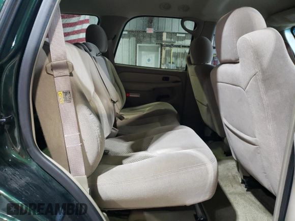 2003 Chevrolet Tahoe LS z VIN 1GNEC13Z23R264941, wystawiony jako Copart lot #56033135 z przebiegiem 195 068 mil mil oraz Szkoda całkowita • Salvage title. Historia ofert i sprzedaży dostępna na DreamBid. Obrazek 11.