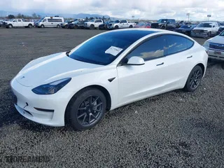2023 Tesla Model 3 with VIN 5YJ3E1EA7PF570871, listed as a IAAI auction lot 41772803 with 1 mi miles. Bid and sale history available at carsss.com. Image 21.