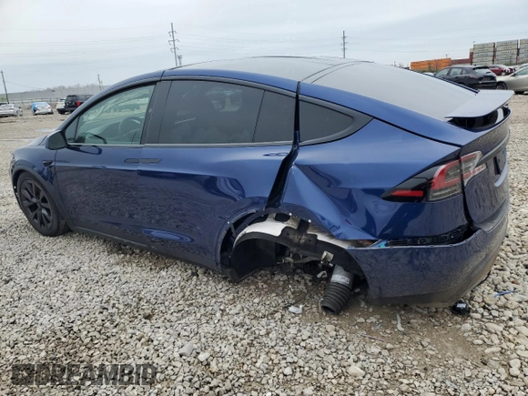 2023 Tesla Model X with VIN 7SAXCDE51PF415778, listed as a Copart auction lot 51792205 with Not Provided miles and Salvage Title. Bid and sale history available at DreamBid. Image 2.
