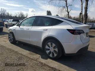 2023 Tesla Model Y Long Range with VIN 7SAYGDEE5PF831826, listed as a Copart auction lot 43752525 with 22,337 mi miles and Salvage Title. Bid and sale history available at DreamBid. Image 2.