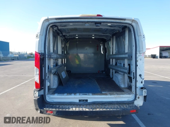 2020 Ford Transit Cargo with VIN 1FTBR2Y80LKA74788, listed as a IAAI auction lot 41939473 with 130,327 mi miles and . Bid and sale history available at DreamBid. Image 17.