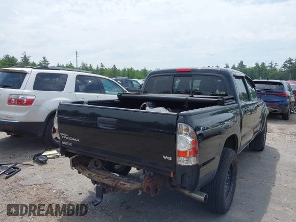 2013 Toyota Tacoma with VIN 3TMLU4EN4DM117239, listed as a IAAI auction lot 42494359 with 239,635 mi miles and . Bid and sale history available at DreamBid. Image 4.