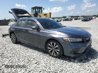 2023 Honda Civic EX-L z VIN 19XFL1H72PE010913, wystawiony jako Copart lot #51608005 z przebiegiem 35 961 mil mil oraz Szkoda całkowita • Salvage title. Historia ofert i sprzedaży dostępna na DreamBid. Obrazek 4.
