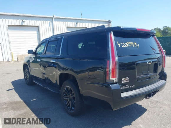 2015 Chevrolet Suburban LT with VIN 1GNSKJKC5FR275357, listed as a IAAI auction lot 42229934 with 359,009 mi miles and . Bid and sale history available at DreamBid. Image 3.