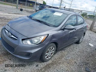 2014 Hyundai Accent GLS with VIN KMHCT4AE6EU670895, listed as a IAAI auction lot 42197066 with 142,983 mi miles and . Bid and sale history available at carsss.com. Image 2.