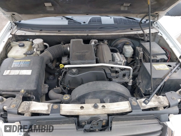 2004 GMC Envoy SLE with VIN 1GKDT13SX42357048, listed as a IAAI auction lot 41601126 with 304,101 mi miles. Bid and sale history available at carsss.com. Image 10.