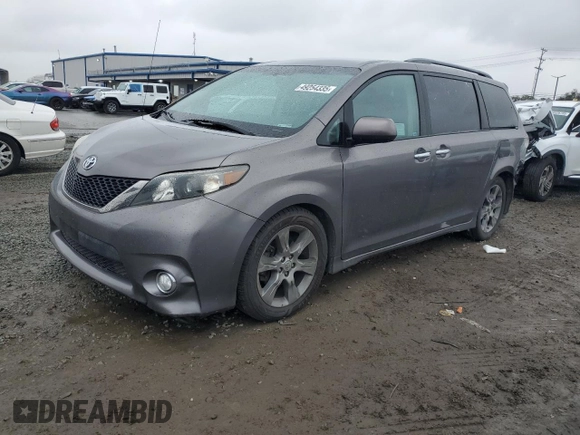 2014 Toyota Sienna SE with VIN 5TDXK3DC3ES470042, listed as a Copart auction lot 49254335 with 99,208 mi miles and Salvage Title. Bid and sale history available at DreamBid. Image 1.