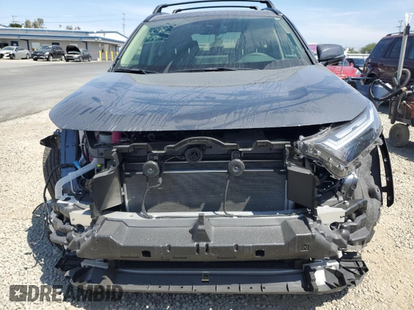 2025 Toyota RAV4 Hybrid XLE Premium with VIN JTMB6RFV8SD152327, listed as a Copart auction lot 53573615 with 12,830 mi miles and Salvage title. Bid and sale history available at DreamBid. Image 5.