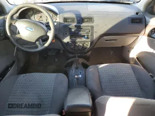 2007 Ford Focus S with VIN 1FAFP34N47W243028, listed as a Copart auction lot 55147695 with 218,672 mi miles and Salvage title. Bid and sale history available at DreamBid. Image 8.