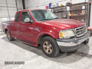 2002 Ford F-150 XL with VIN 1FTRX17L12NA36715, listed as a IAAI auction lot 41850555 with 174,012 mi miles. Bid and sale history available at carsss.com. Image 1.