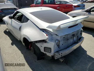 2016 Nissan 370Z with VIN JN1AZ4EH0GM933290, listed as a Copart auction lot 62025304 with 100,275 mi miles and Salvage Title. Bid and sale history available at carsss.com. Image 2.