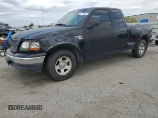 1999 Ford F-150 XL z VIN 2FTRX07L5XCA41021, wystawiony jako Copart lot #51135195 z przebiegiem 176 283 mil mil oraz Czysty tytuł • Clean title. Historia ofert i sprzedaży dostępna na DreamBid. Obrazek 1.