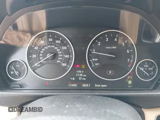 2013 BMW 3 Series 328i with VIN WBA3A5C5XDJ461783, listed as a IAAI auction lot 42150355 with 115,992 mi miles and . Bid and sale history available at DreamBid. Image 7.
